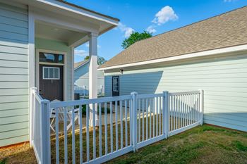 Back yard with decorative fence at anthem luxury rentals and apartments in huntsville, al